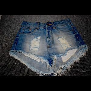 Distressed denim shorts